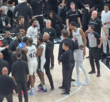 Victor Wembanyama and San Antonio Spurs players during an on-court confrontation with Oklahoma City Thunder players on October 20 2026 opening night